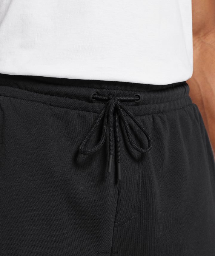 Gymsharkpantalones cortos de 7\" esenciales para el día de descanso hombres negro PFTJ2N541 ropa