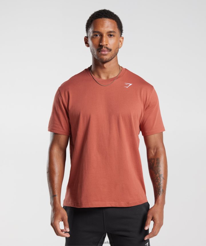 Gymsharkcamiseta con escudo hombres rojo caqui PFTJ2N770 ropa