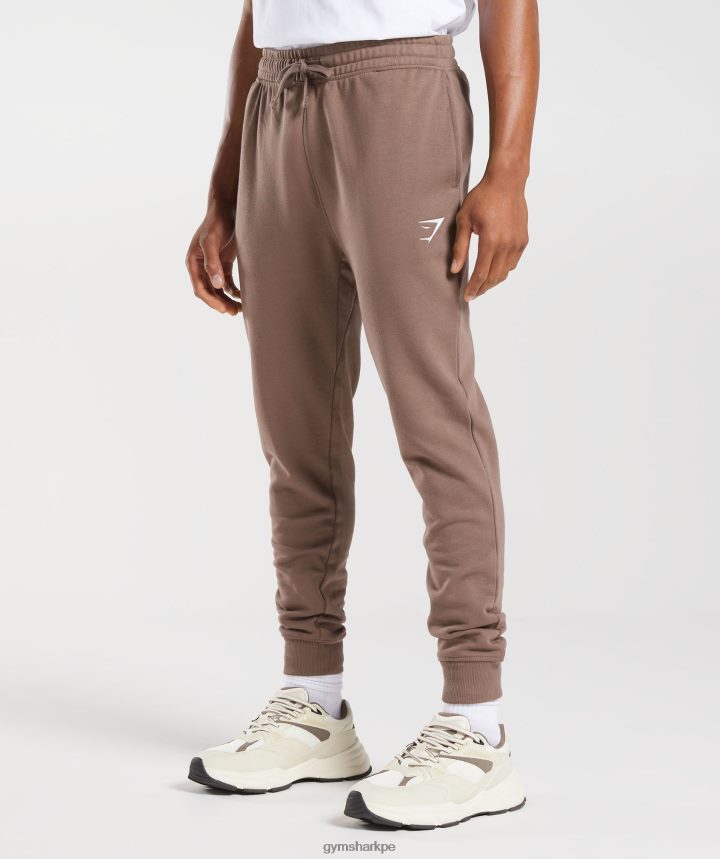 Gymsharkjoggers con escudo hombres marrón trufa PFTJ2N1058 ropa