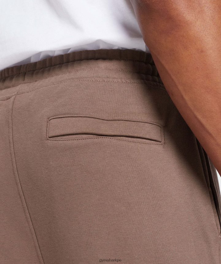 Gymsharkjoggers con escudo hombres marrón trufa PFTJ2N1058 ropa