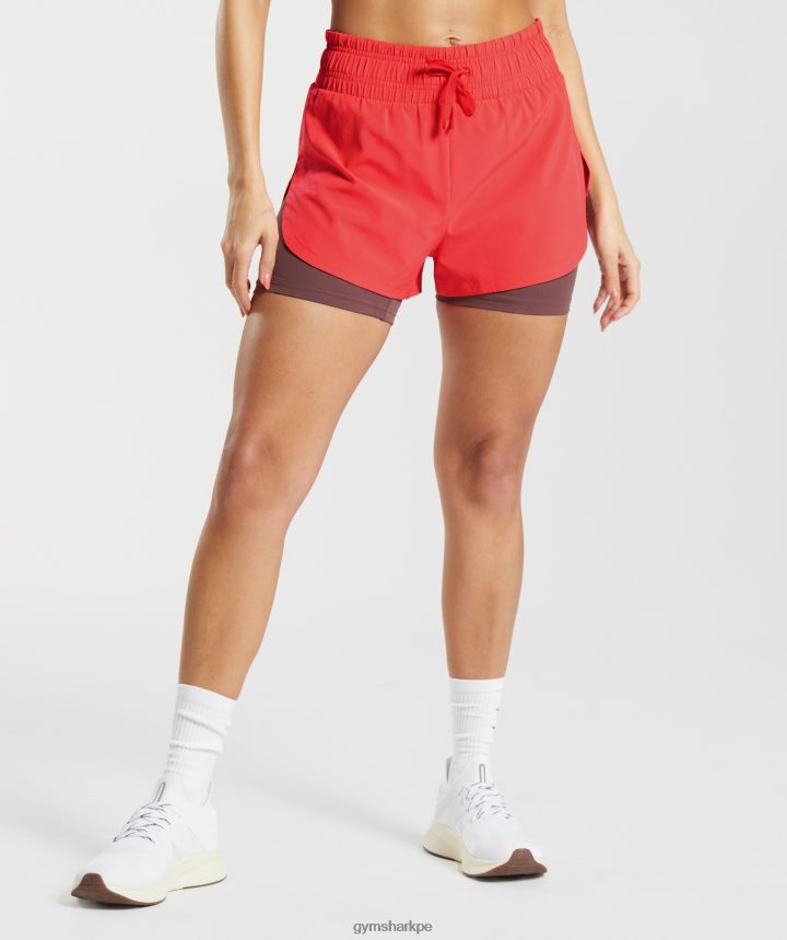 Gymsharkcorrer 2 en 1 pantalones cortos mujer rosa intenso fluo/marrón magenta PFTJ2N51 ropa