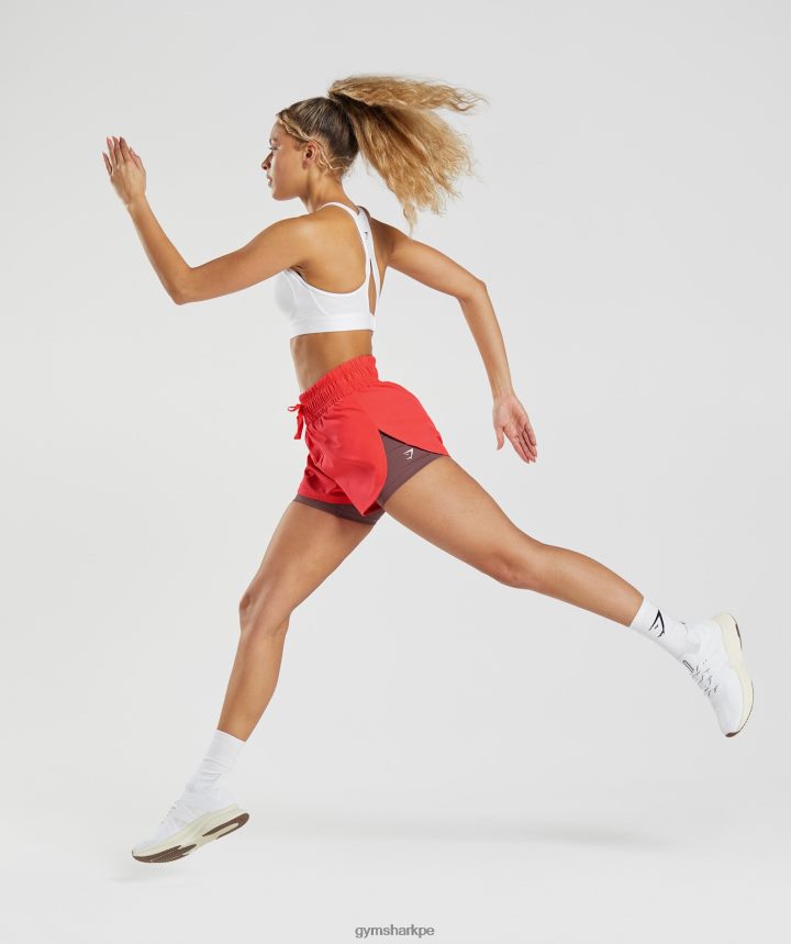 Gymsharkcorrer 2 en 1 pantalones cortos mujer rosa intenso fluo/marrón magenta PFTJ2N51 ropa