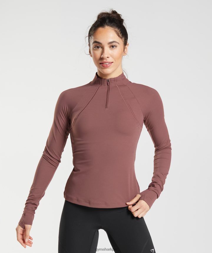 Gymsharkcorrer 1/4 zip mujer marrón magenta PFTJ2N359 ropa