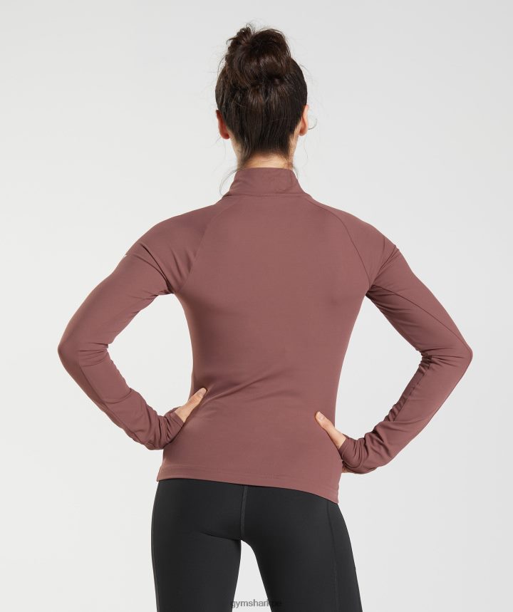 Gymsharkcorrer 1/4 zip mujer marrón magenta PFTJ2N359 ropa