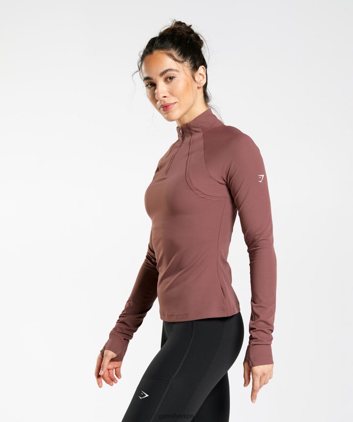 Gymsharkcorrer 1/4 zip mujer marrón magenta PFTJ2N359 ropa