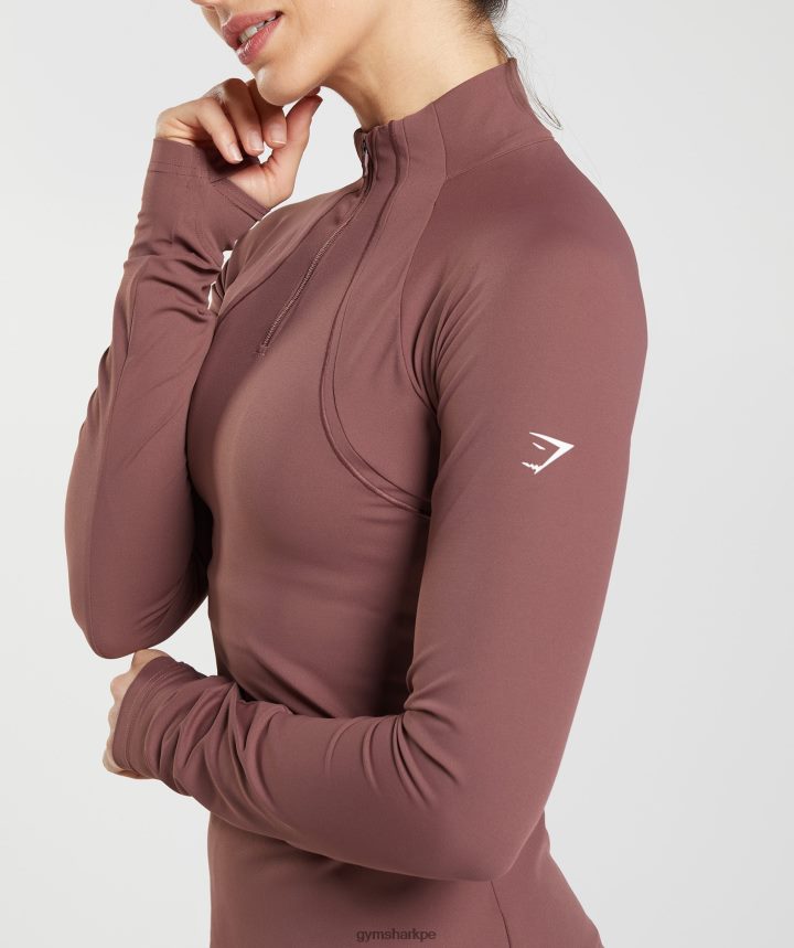 Gymsharkcorrer 1/4 zip mujer marrón magenta PFTJ2N359 ropa